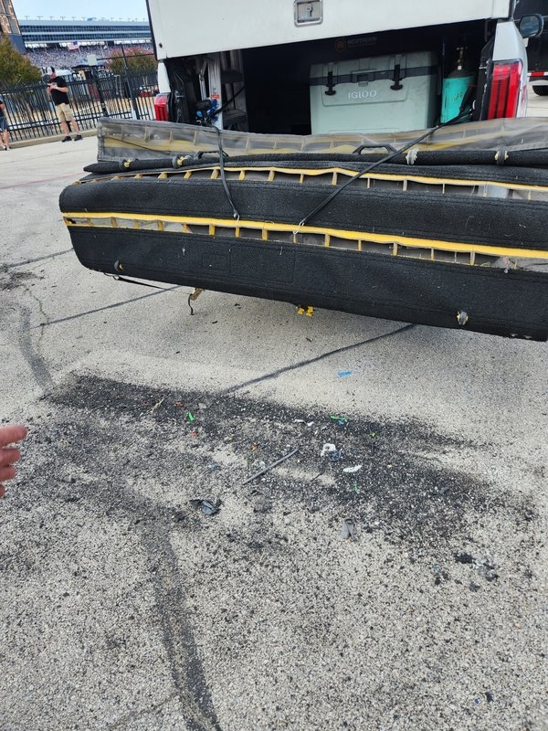 Rubber marbles and tire debris collected from a racetrack surface after a race session
